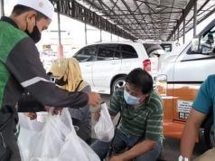 300 pek bubur dan takwim berbuka diedar kepada penduduk sekitar bandar Tawau